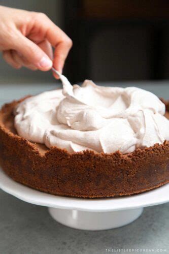 This pie is the perfect combination of crispy puffs and chocolatey clouds! Chocolate Mousse Pie - The Little Epicurean