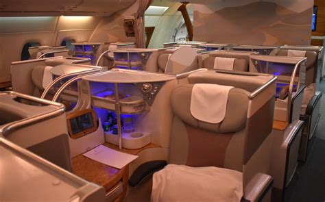 Upon embarkation, we are warmly greeted by the attentive international crew and show to our seats. Emirates A380 Business Class Review | Glitter&Mud