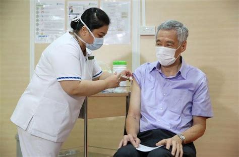 Warriors' lee in covid protocol; Singapore PM receives COVID-19 vaccine, urges others to ...