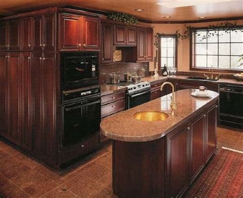 The mahogany cabinets will match well with any stone countertops that have traces of reds or browns in them. Mahogany Wood Cabinet For Kitchen | Black appliances ...