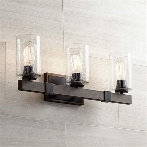 Free shipping and free returns* on our bathroom lighting fixtures. Poetry 23 1/2" Wide Wood Grain 3-Light Vanity Bath Light ...