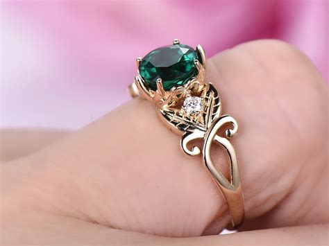 Jamesallen.com has been visited by 10k+ users in the past month $725 Round Emerald Engagement Ring Floral Diamond Shank 14k Yellow Gold - Lord of Gem Rings