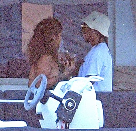 Tmz publica cariñosas fotografías de la pareja en el mar. RIHANNA and Asap Rocky at a Boat in Barbados 12/28/2020 ...