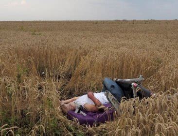 Accident corpses crash crash site crime dead bodies fall flight mh17 graphic graphic images graphic photos malaysia airlines morgue corpse plane scene shot down ukraine victims. Body of one MH-17 passenger lays in a field in east ...