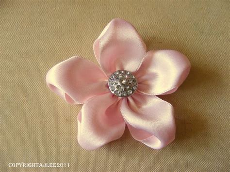 Check spelling or type a new query. Tutorial on different ways to make flowers out of ribbon ...