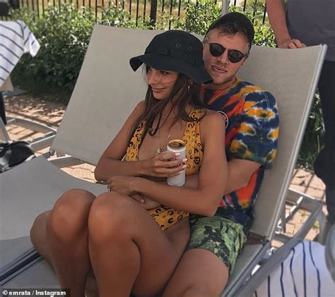 Sebastian is the husband of emily ratajkowski. Emily Ratajkowski sits in her husband's lap as she shows ...
