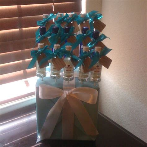 So, what are some great ways to include the expectant father? Favors for the guys for baby shower. Tag says "cheers to ...