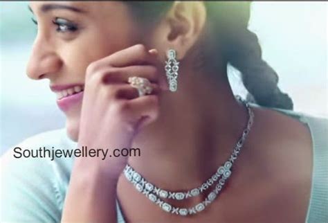 This alluring pretty neck piece studded with diamonds and rubies and. Trisha Krishnan in NAC Diamond Jewellery - Indian ...