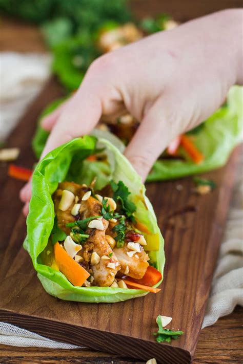 Add the ingredients to a tortilla wrap. Healthy Thai Chicken Lettuce Wraps | B. Britnell