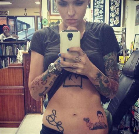 Ruby rose's right ribcage tattoo says so close no matter how far, couldn't be much more from the heart, forever trusting who we are and nothing else matters, which is a line from the song nothing. 52 Sexy Ruby Rose Tattoos For Your Next Ink