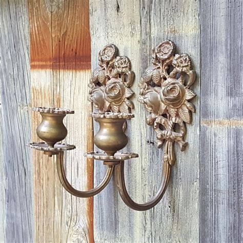 Streamlined lamps with pleated warm brass shades flank the bed with artistic flair. Vintage SET of TWO BRASS WALL SCONCE CANDLE HOLDER w/ ROSE ...