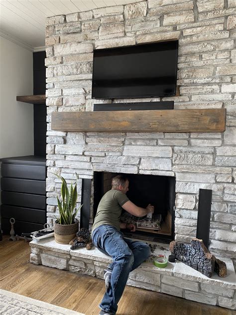 Cover the floor with plastic and adhere it to the area around the fireplace with painters' tape. How to Whitewash a Stone Fireplace - Super Easy Project ...