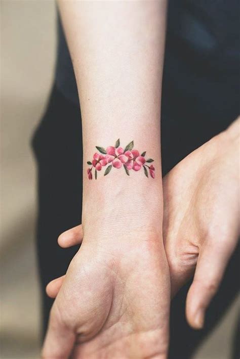 Small pink floral temporary tattoo tattoo sheet size: 39 Delicate Wrist Tattoos For Your Upcoming Ink Session ...