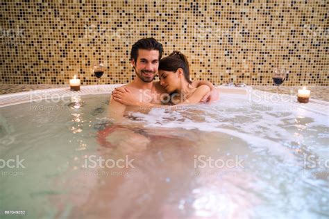 You could even dig a hole in the ground to build a temporary hot tub right in the sand (or in the snow) by securing the hammock within the hole. Romantic Couple Relaxing In Hot Tub At Health Spa Stock ...