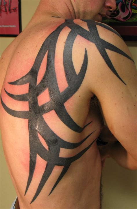 Just along the shoulders neck. Tumb Tattoos Zone: tattoos tribal for men