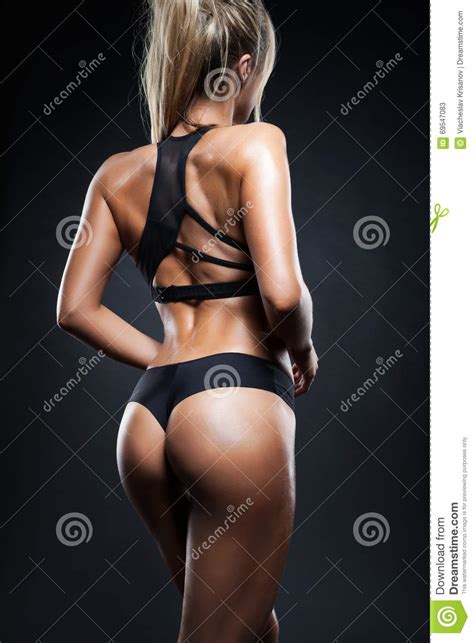 Focus on drawing these muscles inwardly tightly. Fitness girl back stock image. Image of muscular, buttocks ...