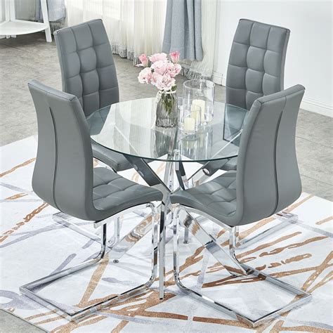 Dining tables and chairs are an essential part of your home. Round Kitchen Table And Chairs Set 4 in 2020 | Glass ...