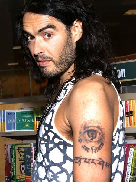 Russell brand has inked in his legs by his loving sweetheart wife katy perry. Russell Brand Shoulder Tattoos | Russell brand, Left arm ...