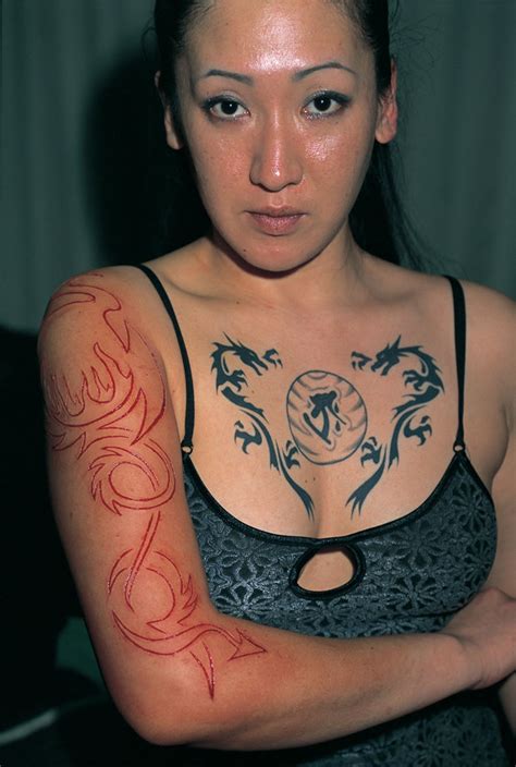 Images of fresh or healing scarification. Extreme tattoos and piercing: World's craziest body ...