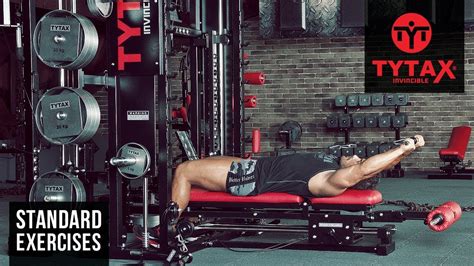 Strength training and home gyms. TYTAX® T1-X | Cable Lying Front Raise - YouTube