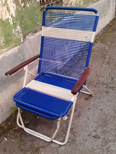 Dengan kursi lipat ini, anda dapat bersantai sambil melihat pemandangan dan menikmati suasana di luar ruangan. Tunggak Jati Art: kursi lipat / santai pentil