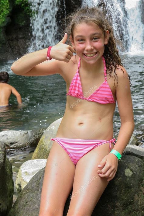 Rules everything must be loli related and humorous in nature. Young girl 10 with a pink swim suits — Stock Photo ...