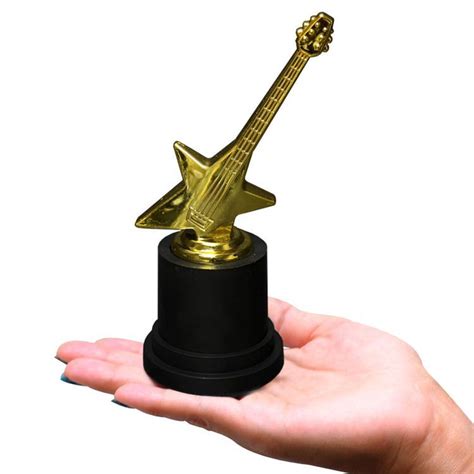 Advertising allows us to keep providing you awesome do the best you can when you decorate cinderella's room full of charming princely decorations! Guitar Award Statue | Windy city novelties, Statue, Novelties