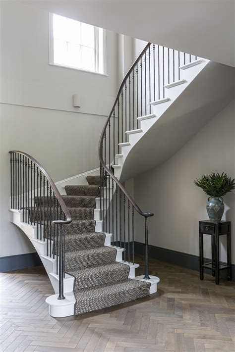 I like the way the rails seen to travel through to the lower level. Georgian Staircase in 2020 | Staircase design, Staircase ...