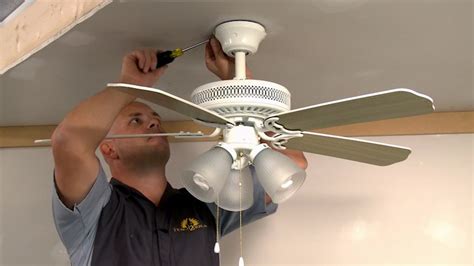 The base for the old fan was held by two 3.5 big nails. How to Replace a Ceiling Fan | Pt 1 | Curious.com