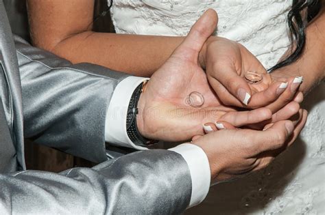 You may use the following text to give some exposure to the photo. Man And Woman With Wedding Rings In Open Hands Stock Image - Image of closeup, showing: 57336669