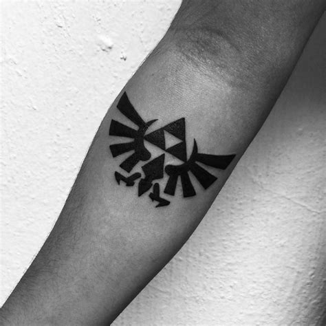 The triforce tattoos are immediately recognized and loved by all people who had played video games for the last few decades. 85+ Mighty Triforce Tattoo Designs & Meaning - Discover ...