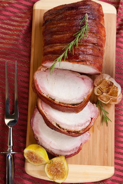 Cut the tenderloins in thin slices on the bias and serve. This Bacon Wrapped Pork Roast Is Every Bit As Delicious As It Sounds! - 12 Tomatoes