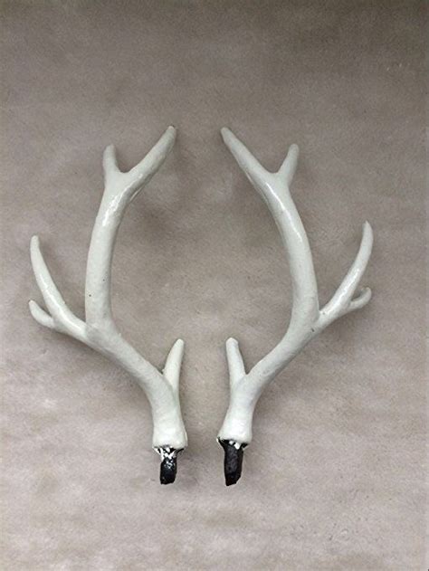 Even a popular piece, such as a large metal star, can have multiple looks based on the type of metal used, the finish, and the amount of polish. Amazon.com: ZILIN 17CM Artificial White Deer Antlers a Pair Wall Decoration: Home & Kitchen ...
