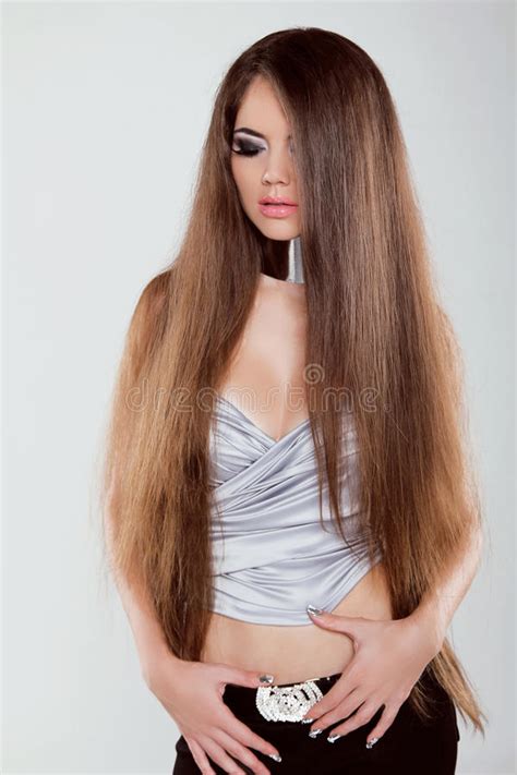 If you are interested to order a customized long hair play video with these models, please contact us. Fashion Model Girl With Long Healthy Hair Posing At Studio ...