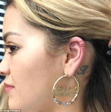 Rita ora showed off her enviable curves in a cheerleading uniform on sunday as she attended the.the latest media tweets from rita ora(@ritaora). Rita Ora adds to her collection of tattoos | Daily Mail Online