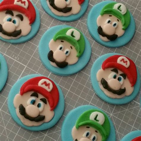 Everything was made with gumpaste. Super Mario Bros. Fondant Cupcake Toppers Mario by ...