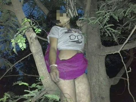 In almost all situations, you should use the word hung. Woman Hangs in a Tree