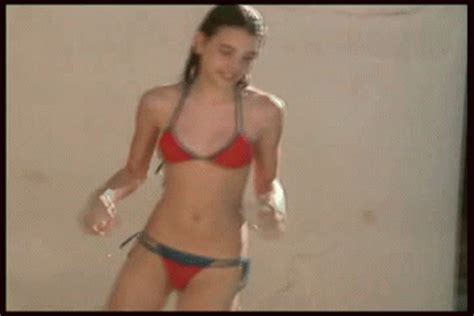 Masturbating at the public beach while voyeurs watch and get horny. Pretty Teenie in Bikini in Back Yard Pool (All Sexy GIFS)