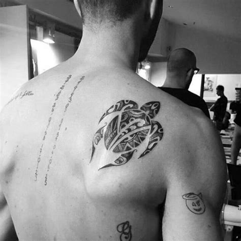 Firstly, it is a rather large area, so big pieces fit well. Guy With Swimming Turtle On Shoulder Blade Tribal Tattoos ...