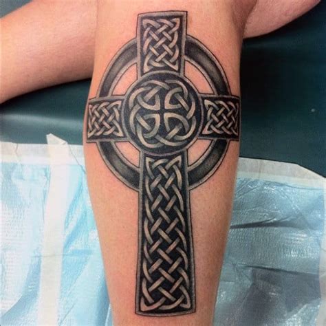 This type of tattoo is big in size and can only have black and red color in it. 100 Celtic Cross Tattoos For Men - Ancient Symbol Design Ideas