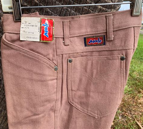 Ariat boot cut jeans offer a wide opening which works perfectly for stacking wit your favorite pair of western or work boots. Male Delta Light Brown 70s Vintage Boot Cut Cotton Denim Jeans