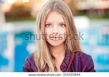 At 13 years old you start to join the big leagues by choosing a girl's fashion swimsuit ! Beautiful Blonde Teenage Girl 1315 Year Stock Photo ...