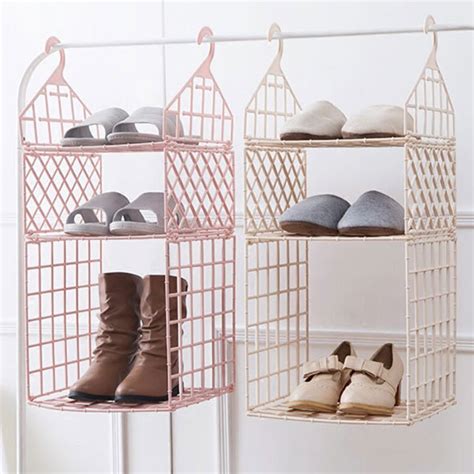 Not only does it give you four square cubbies to store folded items, but it also has an additional metal rod for hangers. Hanging Closet Organizer - ApolloBox
