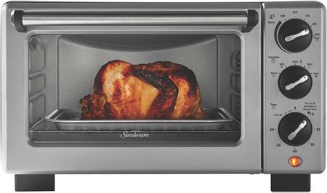 It's not the food that is different; Sunbeam COM3500SS Convection Bake and Grill Compact Oven ...