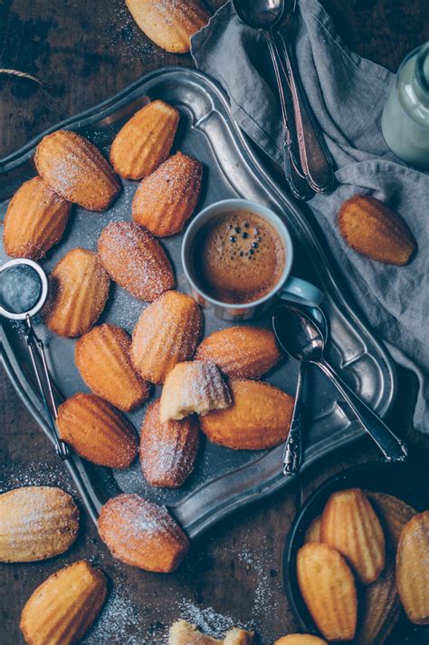 Using a hand whisk, beat the eggs, lemon zest and vanilla extract together rapidly for at least 8 minutes. Moist Madalines - French Madeleines Recipe Step By Step ...