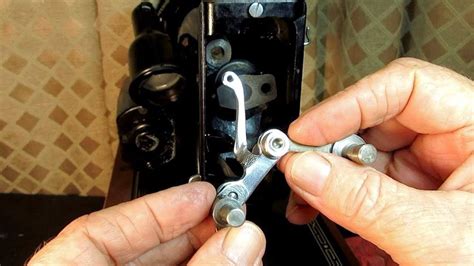 The stitch width regulating lever a may be turned upward, if desired. The Needle Bar and Take-Up System of a Singer Model 99K ...