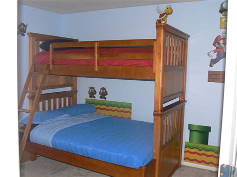 Super mario world kid's bedroom with custom built castle bed, complete with pipe tunnel into the castle level. Super Mario Bros bedroom | Boys room decor, Mario bros ...