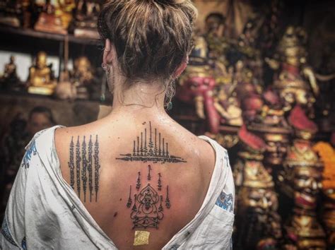 5 line sak yant tattoo. Sak Yant (5 lines, Gao yord and Ganesha) by Arjan Neng | Bamboo tattoo, Tattoos, Sak yant tattoo
