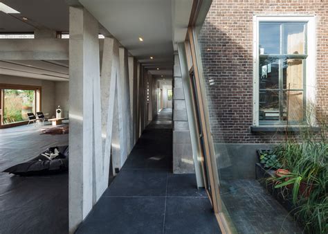 A lease agreement allows a tenant to occupy space in exchange for the payment of rent to the landlord. Bekkering Adams adds concrete extension to Dutch toll house