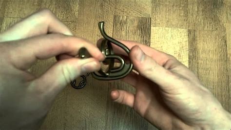 This video shows a clear solution to the hanayama enigma puzzle from your perspective.for weekly puzzle solutions: Hanayama Enigma Puzzle Solution (Quick and Easy) - YouTube